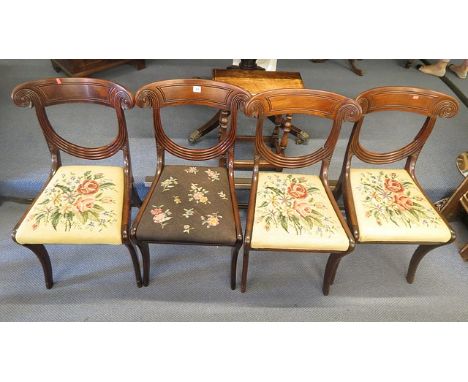 A set of four William IV mahogany chairs with drop-in tapestry seats