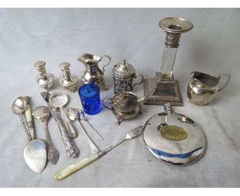 Two silver cream jugs, German candlesticks, silver cruet items, hip flask and cutlery, silver items 354.6 grams