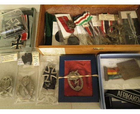 A selection of German WW2 and later medals and badges, some copies, to include an Order of the German Eagle 5th class medal a