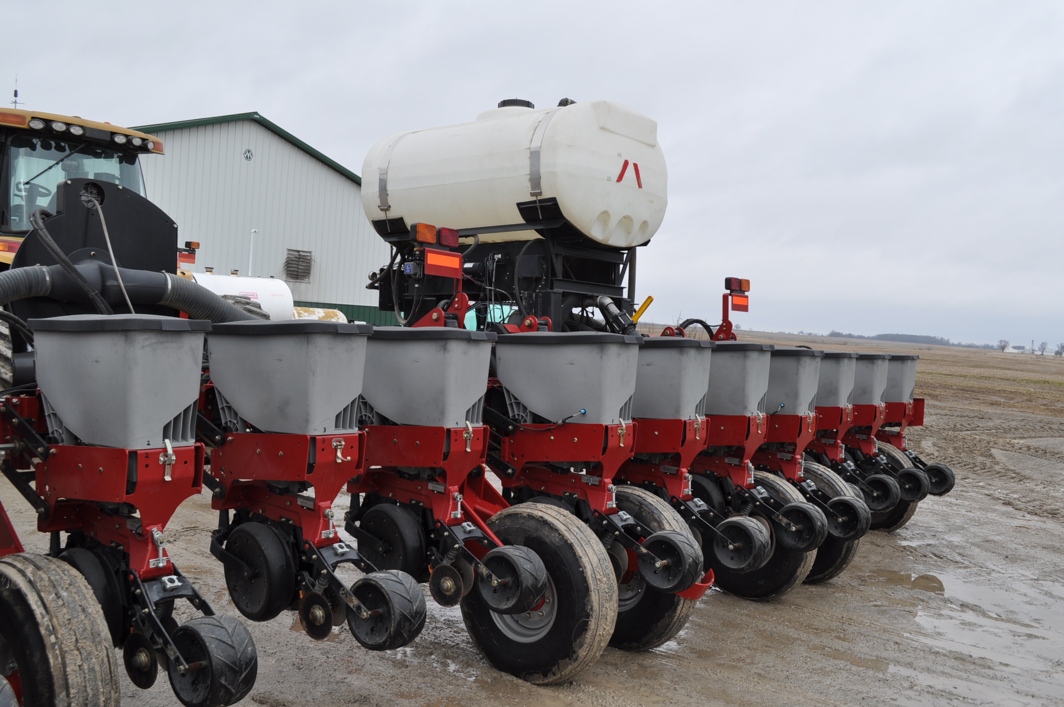 2010 CaseIH 1250 12 row corn planter, on row seed hoppers, in furrow