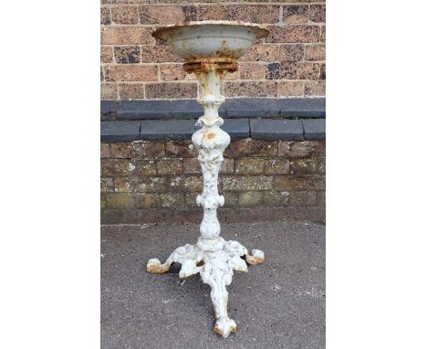 A VICTORIAN CAST IRON BIRDBATH the basin on a tripod stand 74 cm high