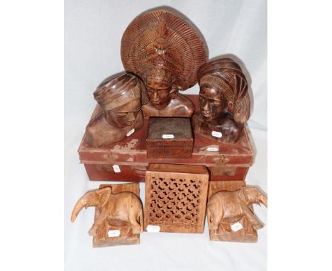 A COLLECTION OF WOODEN CARVINGS a vintage case and sundries