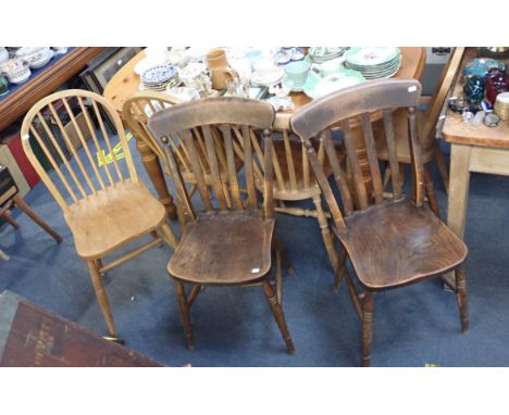 A PINE TABLE four stick back kitchen chairs, and similar chairs with a stool (10)