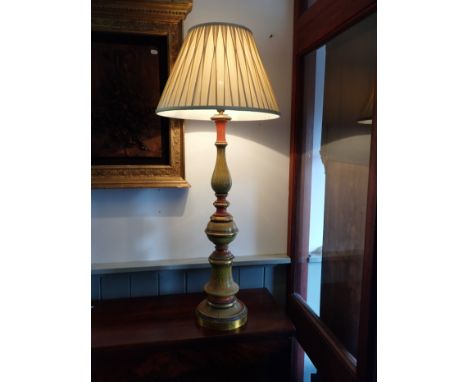 AN ITALIAN  TURNED WOOD GESSOED AND GILT LAMP in the style of an altar candlestick 71 cm high plus fitting
