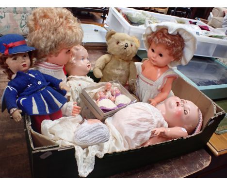 A COLLECTION OF VINTAGE DOLLS and a long-suffering Teddy bear