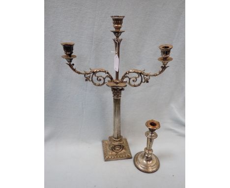 A SILVER PLATED CANDELABRA and a single candlestick (2)