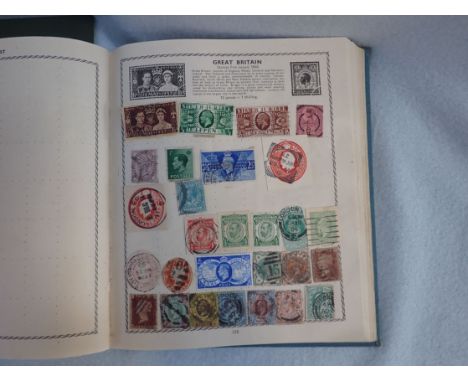 A VINTAGE 'TRIUMPH' STAMP ALBUM circa 1930s