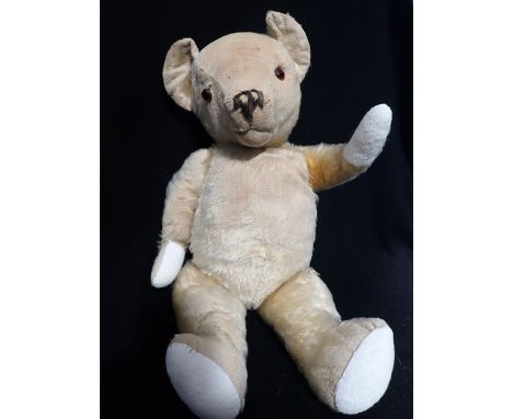 A VINTAGE PLUSH TEDDY BEAR 52 cm high, (worn, replaced paw pads, in need of a good home)