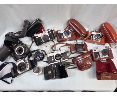 A COLLECTION OF VINTAGE CAMERAS and some more modern