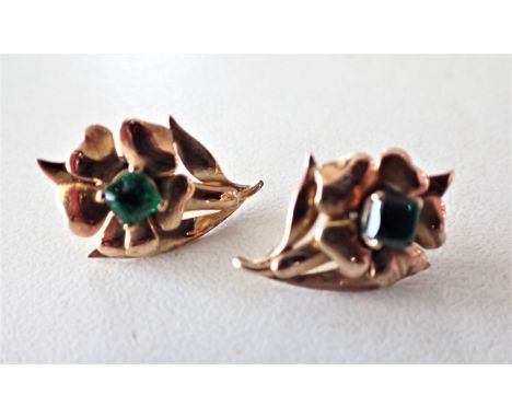 FLOWER MOTIF STUD EARRINGS cocktail style comprising a flower and leaves, set centrally with a square calibre-cut synthetic g