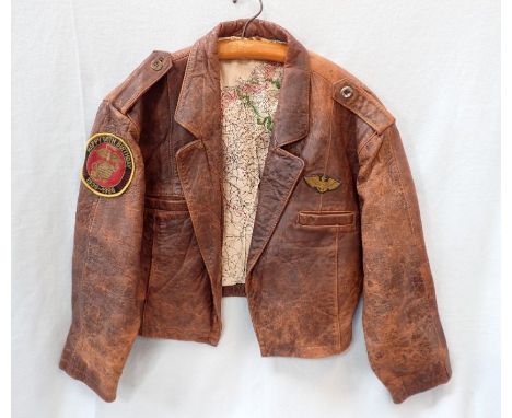 A LEATHER FLYING STYLE JACKET the lining printed with 'escape maps'