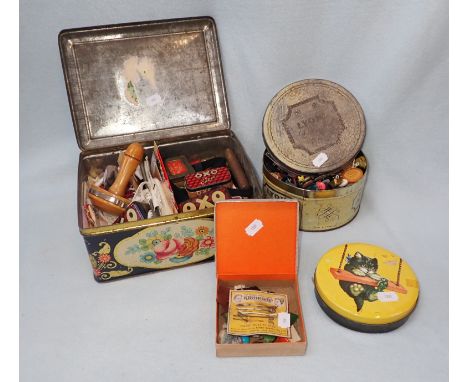 A VINTAGE TIN CONTAINING SEWING EQUIPMENT and other vintage tins