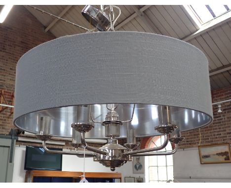 A CONTEMPORARY SIX BRANCH HANGING LAMP in chrome with a large grey shade