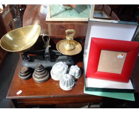 A MODERN RED LEATHER COVERED FRAME (boxed) a set of scales and a collection of vintage aluminium jelly moulds