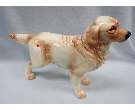 A LARGE GOEBEL STUDY OF A GOLDEN RETRIEVER 44cm long