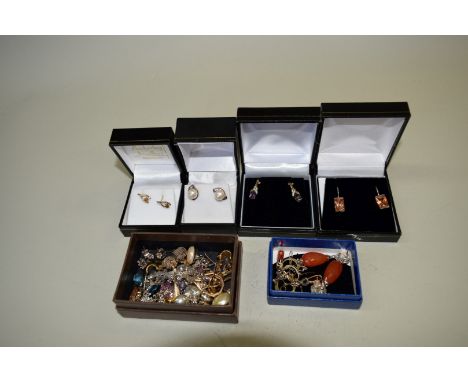 A pair of pearl ear studs; together with a large quantity of pendant and stud earrings.