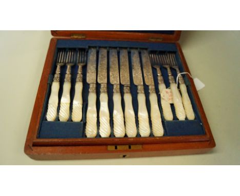A mahogany cased set of twelve Victorian pairs of silver dessert knives and forks, by Atkin Bros Ltd, Sheffield 1890-93, havi
