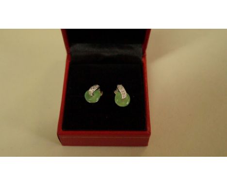 A pair of Chinese jade and diamond set ear studs.