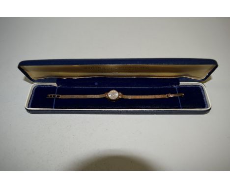 A Rotary 9ct gold ladies wristwatch. Condition Report: Both case and bracelet are marked 9k.
Weight without movement: 10.9g. 