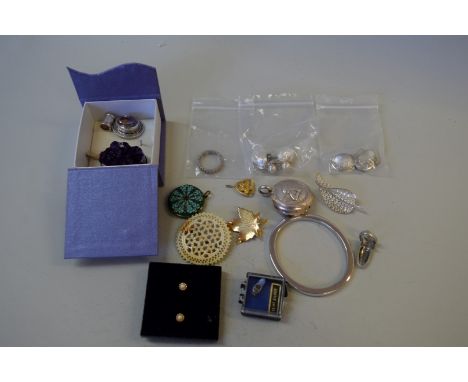 A large amethyst crystal pendant; together with a silver hinged bangle and a variety of silver and other jewellery.