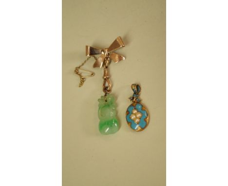 A carved jade pendant on gold coloured bow suspended brooch; together with a blue enamel pendant. Condition Report: The ename