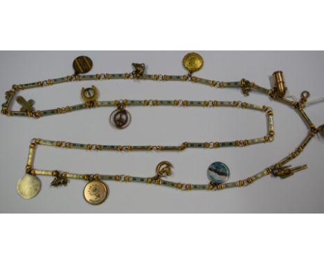 A 19th century unmarked yellow metal and enamel necklace, 106cm approximately, having eighteen attached silver, gold and meta