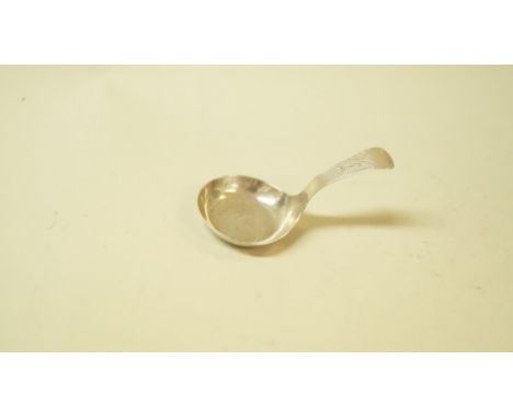 A George III silver caddy spoon, by T.W, having chased decoration.