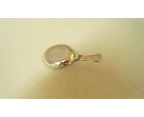A George III silver caddy spoon, by T W.