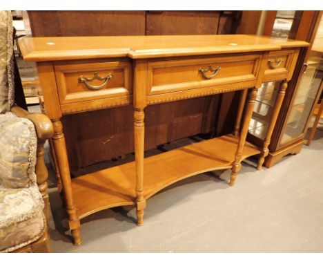 Modern breakfront console table with three drawers W: 135 cm 