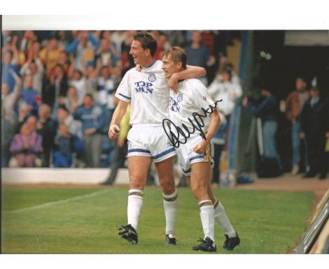 Autographed 12 x 8 photo, LEE CHAPMAN, a superb image depicting Leeds United's John Pearson celebrating with team mate Lee Ch