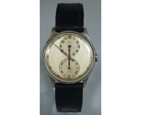 Vintage Tell steel Doctors regulator style wristwatch with sweep seconds hand and two ancillary dials. Leather strap.(B.P. 21