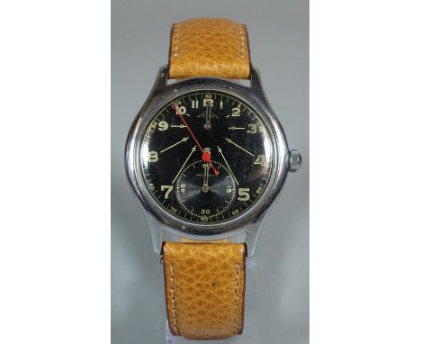 An unusual Solix vintage steel Doctors regulator type wristwatch with sweep seconds hand and two ancillary dials to the black