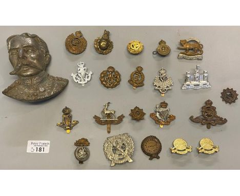 Collection of assorted British Military cap badges, various, together with a metal relief portrait bust, possibly of Lord Kit