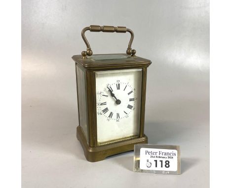 Early 20th century brass carriage clock with full depth Roman and Arabic dial.  12cm high approx.  (B.P. 21% + VAT) 
