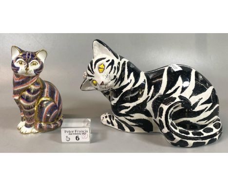 Royal Crown Derby Imari paperweight of a seated cat. Together with an Italian ceramic recumbent hand painted black and white 