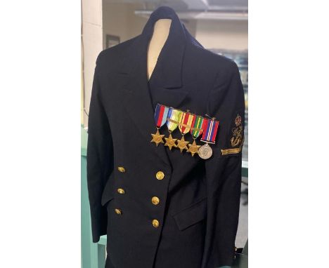Naval Officer's uniform together with personal photographs, WWII medal group to include: 1939-45 Star, Atlantic Star with Fra