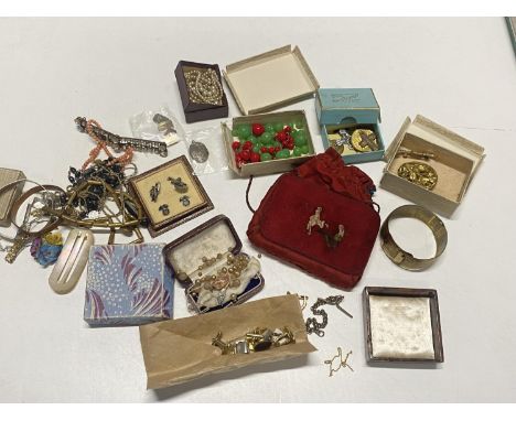 A job lot of assorted vintage costume jewellery including some silver