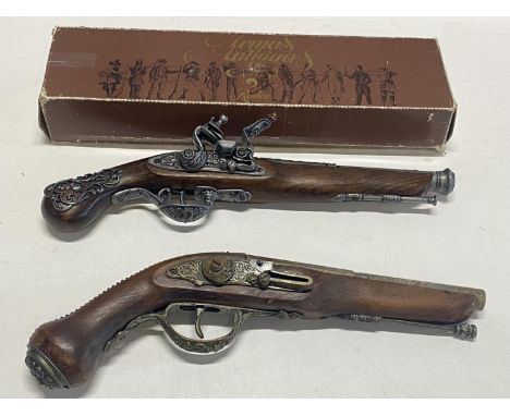 two vintage wall hanging flintlock pistols one boxed