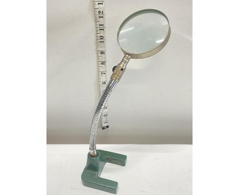 A vintage watchmakers/jewellers adjustable magnifier