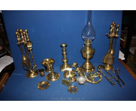 A quantity of brass including two Companion Sets, candlesticks a/f, horseshoe Door Knocker, small brass Lamp, etc.