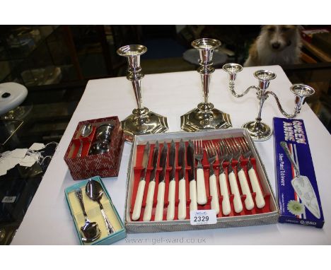A quantity of plated including set of six fish knives and forks, pair of candlesticks, chrome plated commemorative sugar and 