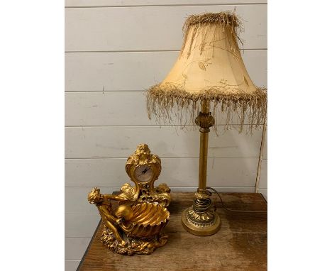 A selection of items to include clock, cherub themed dish and a lamp.