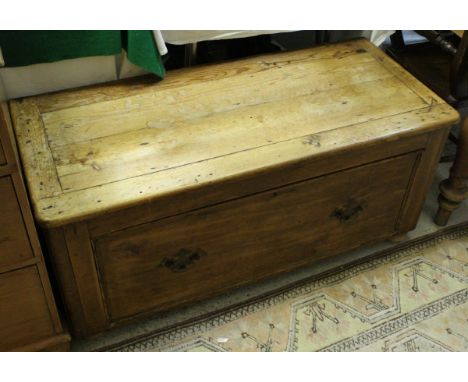 A low pine bench with drawer under on turned feet