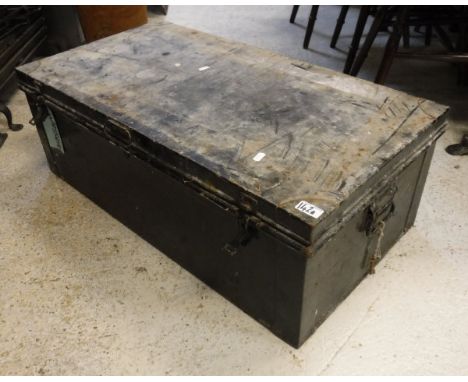 A black painted tin trunk containing various mid 20th Century vintage maps
