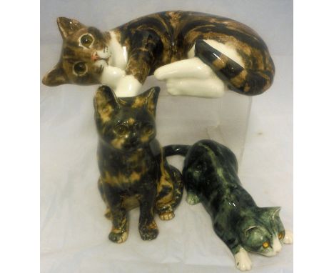 A Mike Hinton ceramic figure of a kitten, together with two further Mike Hinton figures of cats