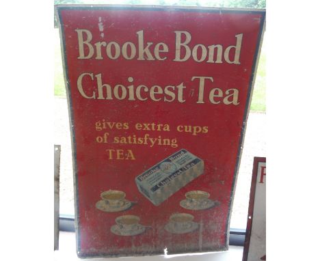 An enamel advertising sign "Brooke Bond Choicest Tea gives extra cups of satisfying tea"