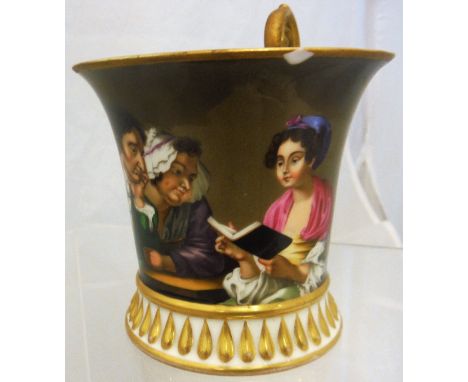 A Continental cabinet cup with painted decoration in the manner of Teniers of a girl reading a book with two onlookers, heavy