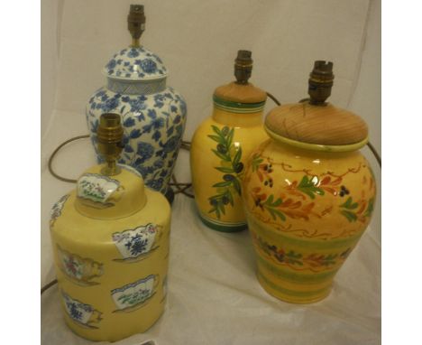 Four assorted ceramic bodied table lamps to include one of Chinese lidded vase formdecorated with scrolling blue flowers onto