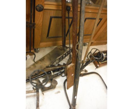 Assorted tools to include two-man saw, a further saw, shoelast and irons etc