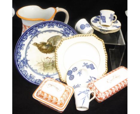 A collection of eight Worcester Aesthetic coffee cans and saucers, a pair of Royal Doulton game bird decorated plates, a Mint